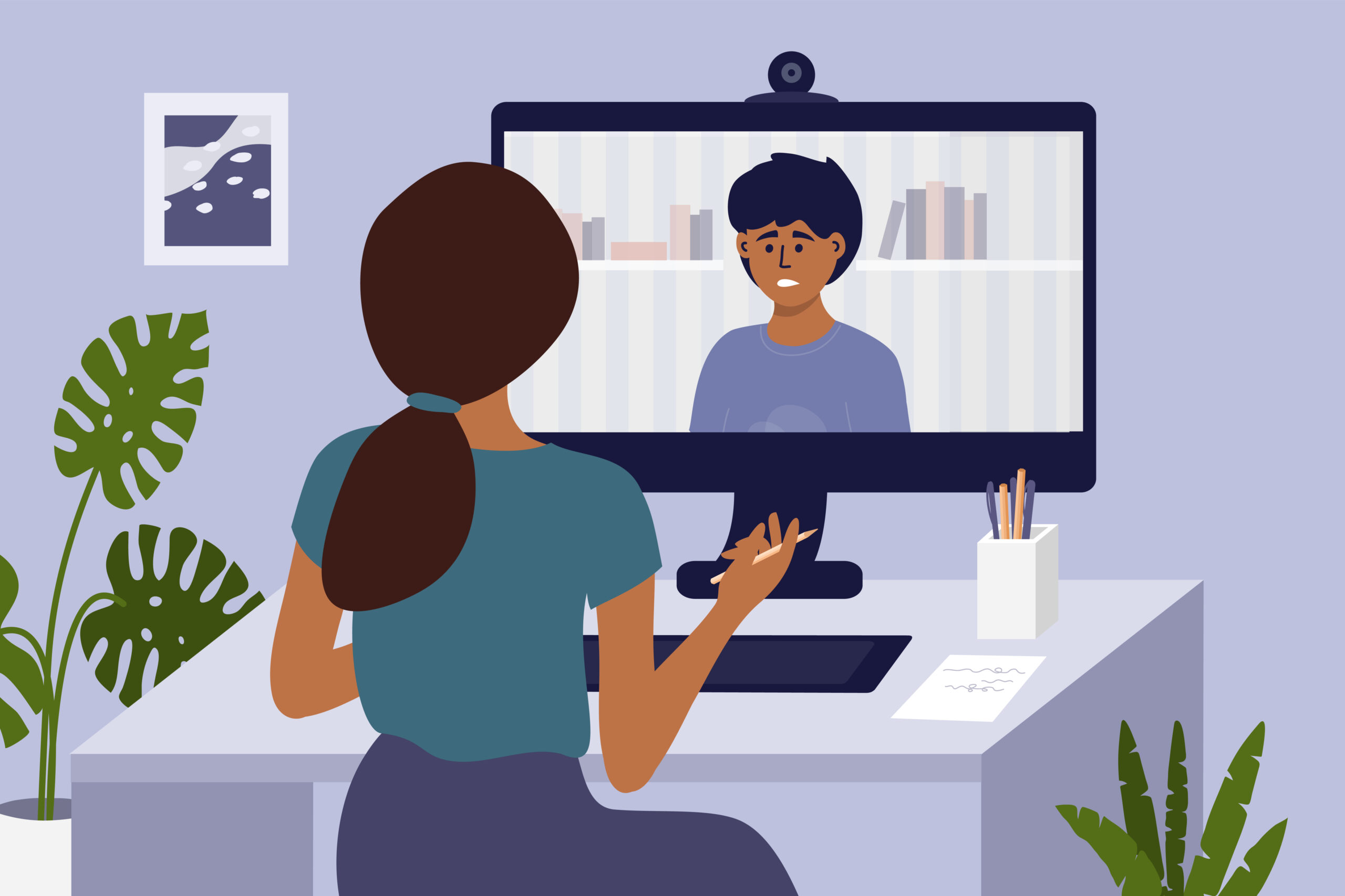 IT staff leaving concept. Young black woman sitting in front of PC monitor talking to another staff member.