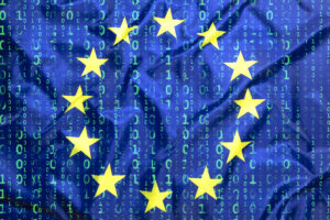 EU AI Act concept. EU flag superimposed on binary code